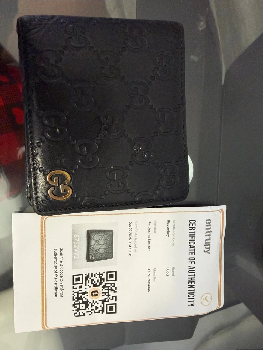 Gucci Black Embossed Interlocking G Leather Bi-Fold Wallet